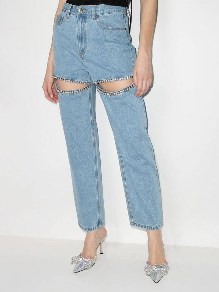 Ladies jeans with an extravagant cut-out design and glittering embellishments
