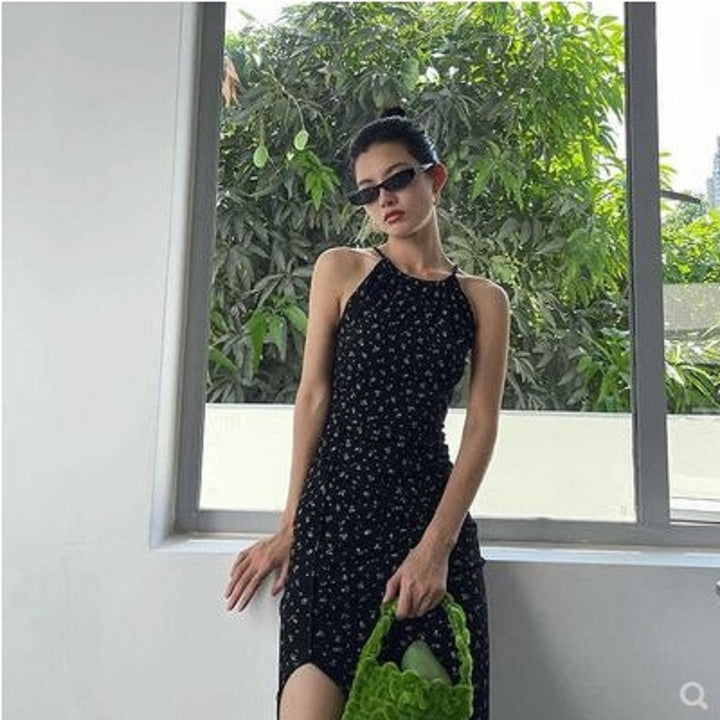 Ladies floral dress with deep back neckline and asymmetric hem