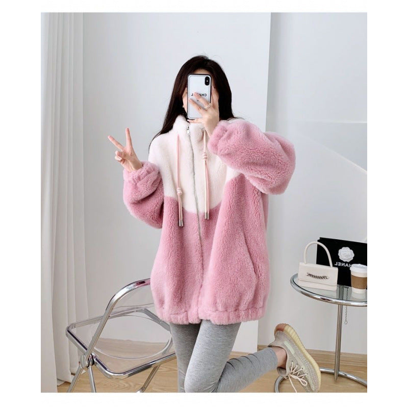 Women’s plush jacket with high closing collar and practical zippered pockets Lisslune