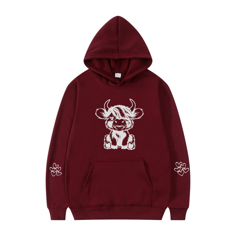 Women's hooded sweatshirt with charming cow motif and practical kangaroo pockets Lisslune