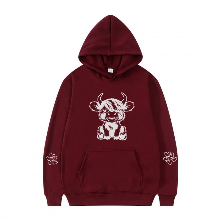 Women's hooded sweatshirt with charming cow motif and practical kangaroo pockets Lisslune