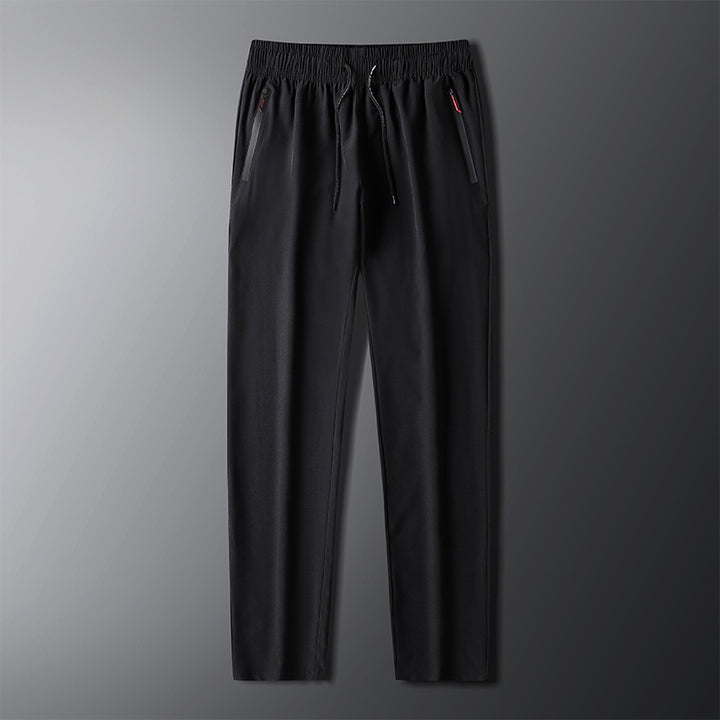 Men's sporty jogging pants with elastic waistband and side zipper Lisslune