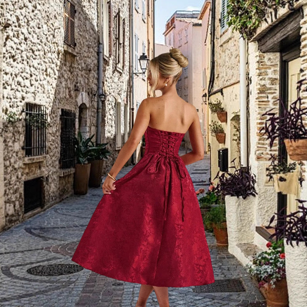Ladies cocktail dress with elegant bustier top and flared skirt