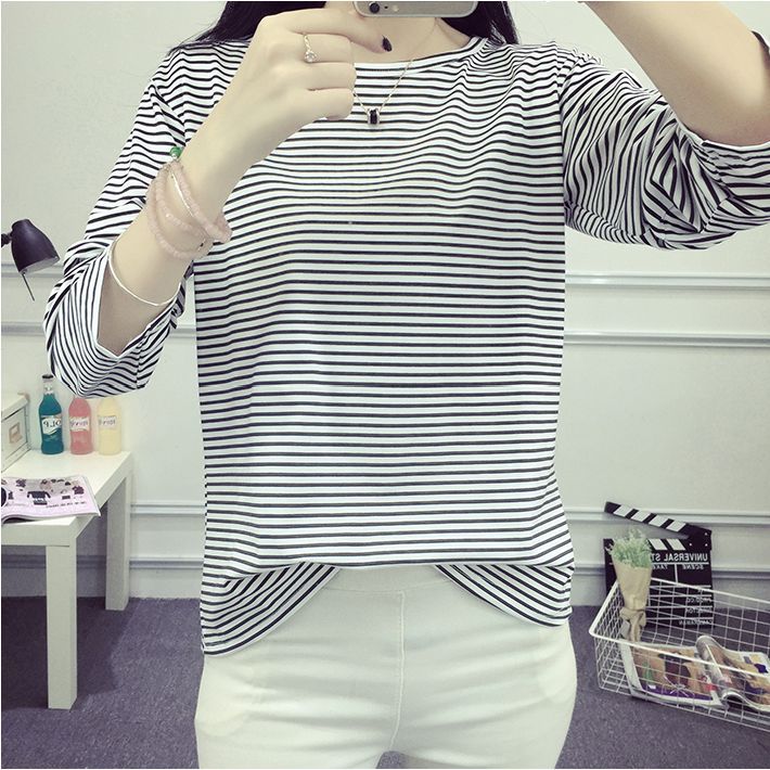 Women's striped long-sleeve shirt with soft textured fabric and casual fit