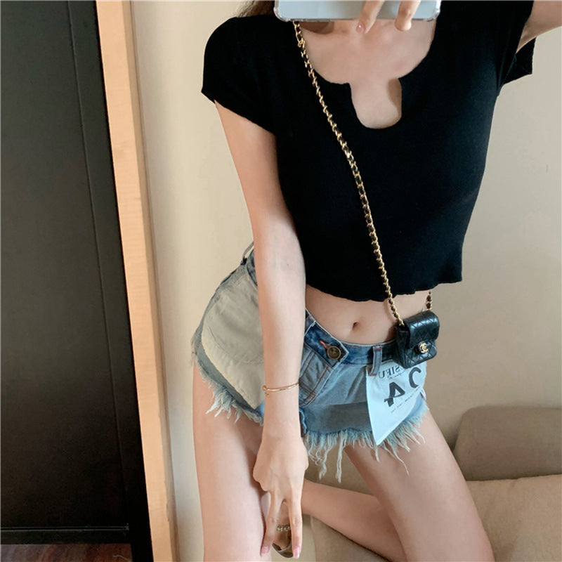 Women's short sleeve top with unique V-neckline and modern design