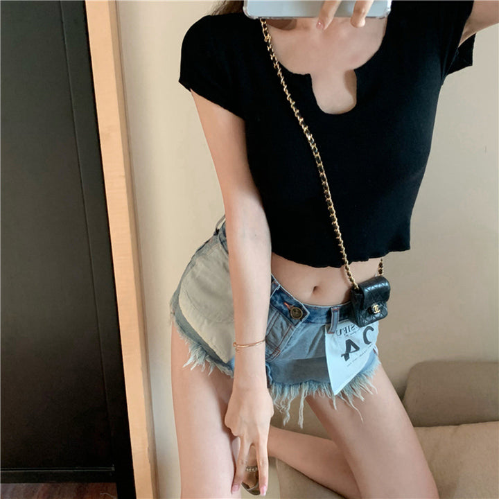 Women's short sleeve top with unique V-neckline and modern design