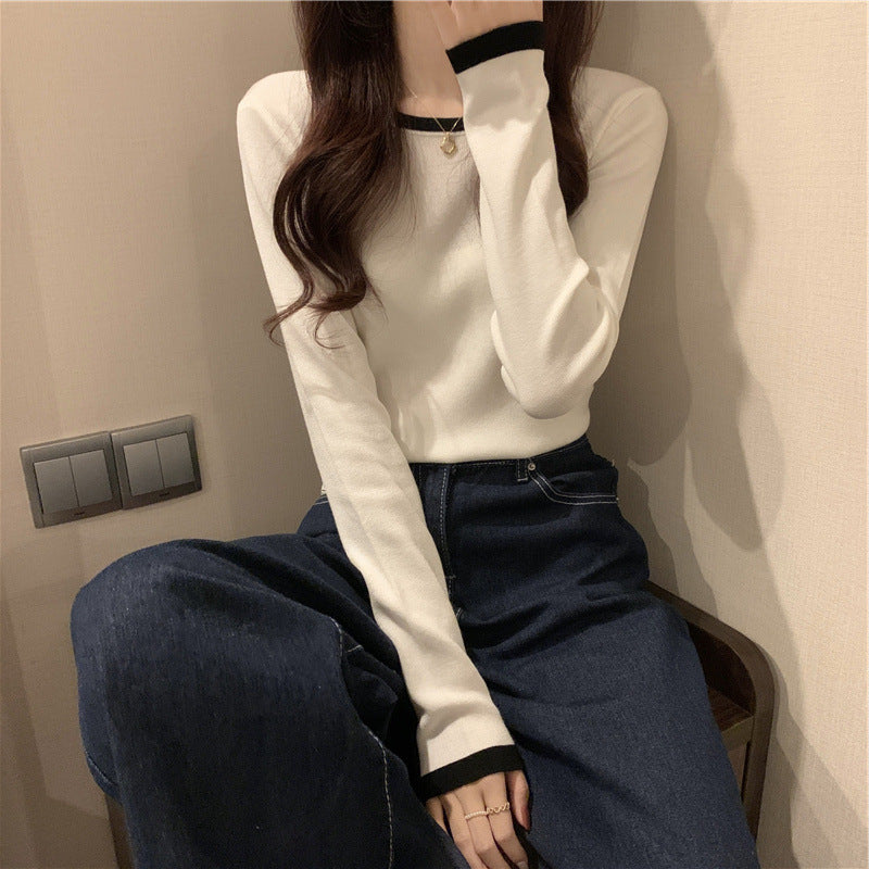 Women's long sleeve top with elegant contrasting collar and figure-flattering cut