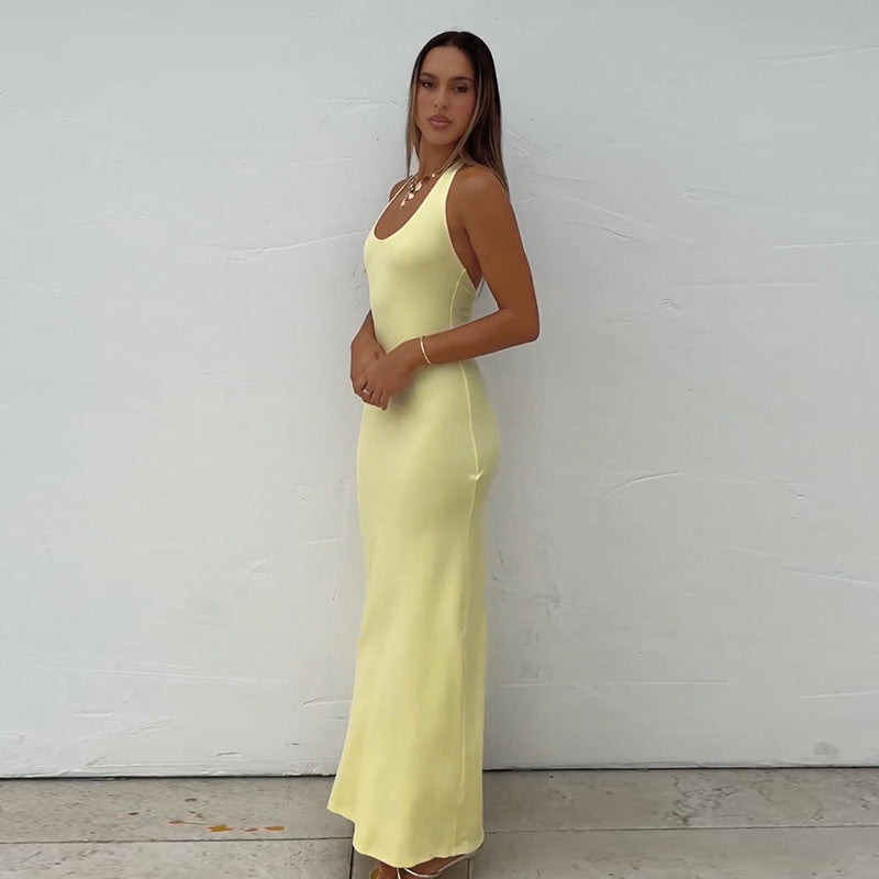 Ladies floor-length summer dress with a figure-hugging cut and elegant bateau neckline