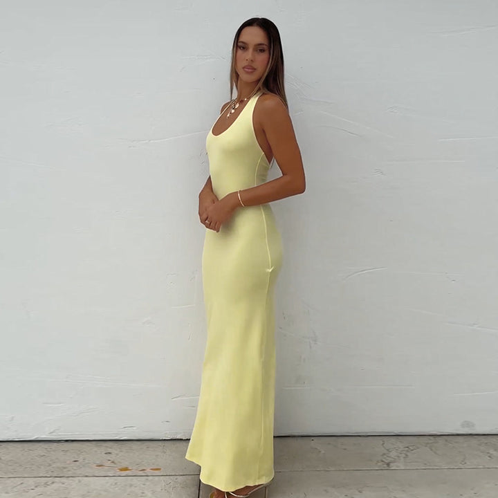 Ladies floor-length summer dress with a figure-hugging cut and elegant bateau neckline