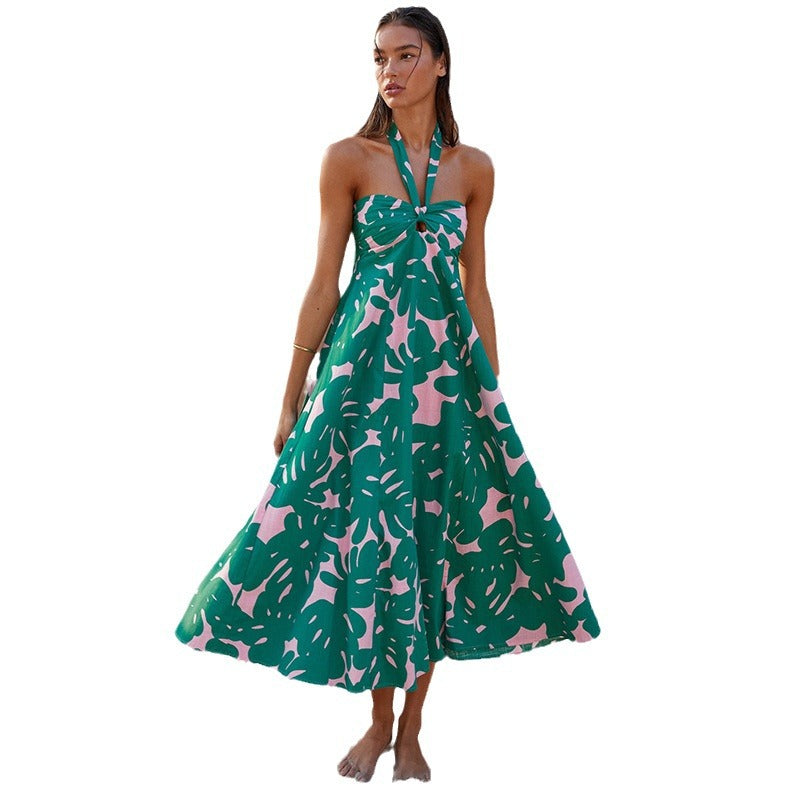Women's maxi dress with floral bandeau design and elegant flared skirt