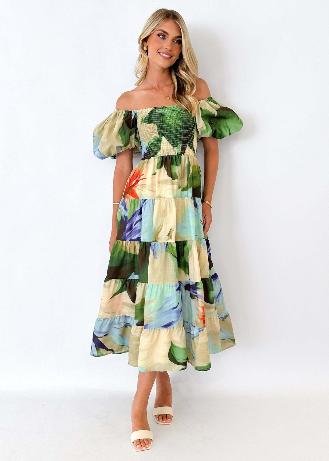Women's maxi dress with puff sleeves and floral smocking