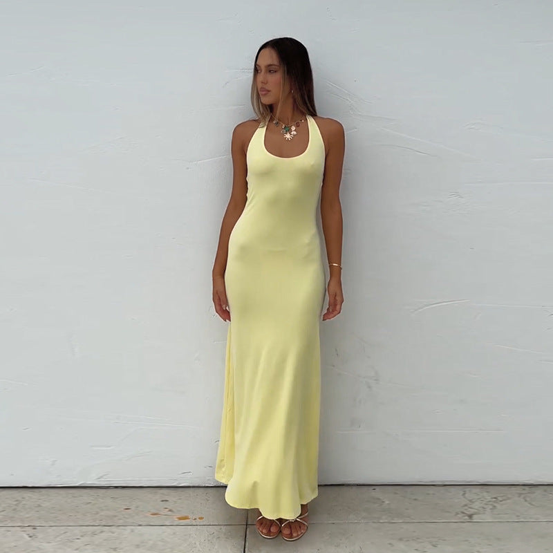 Ladies floor-length summer dress with a figure-hugging cut and elegant bateau neckline
