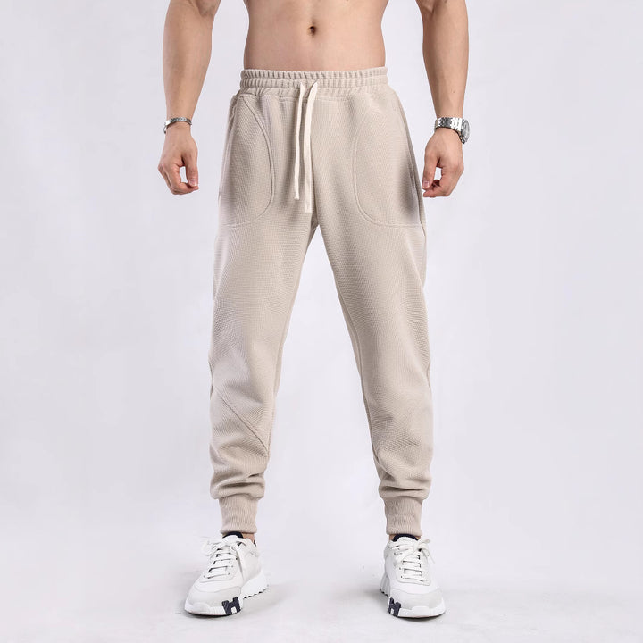 Men's sporty jogging pants with breathable inserts and elastic waistband Lisslune