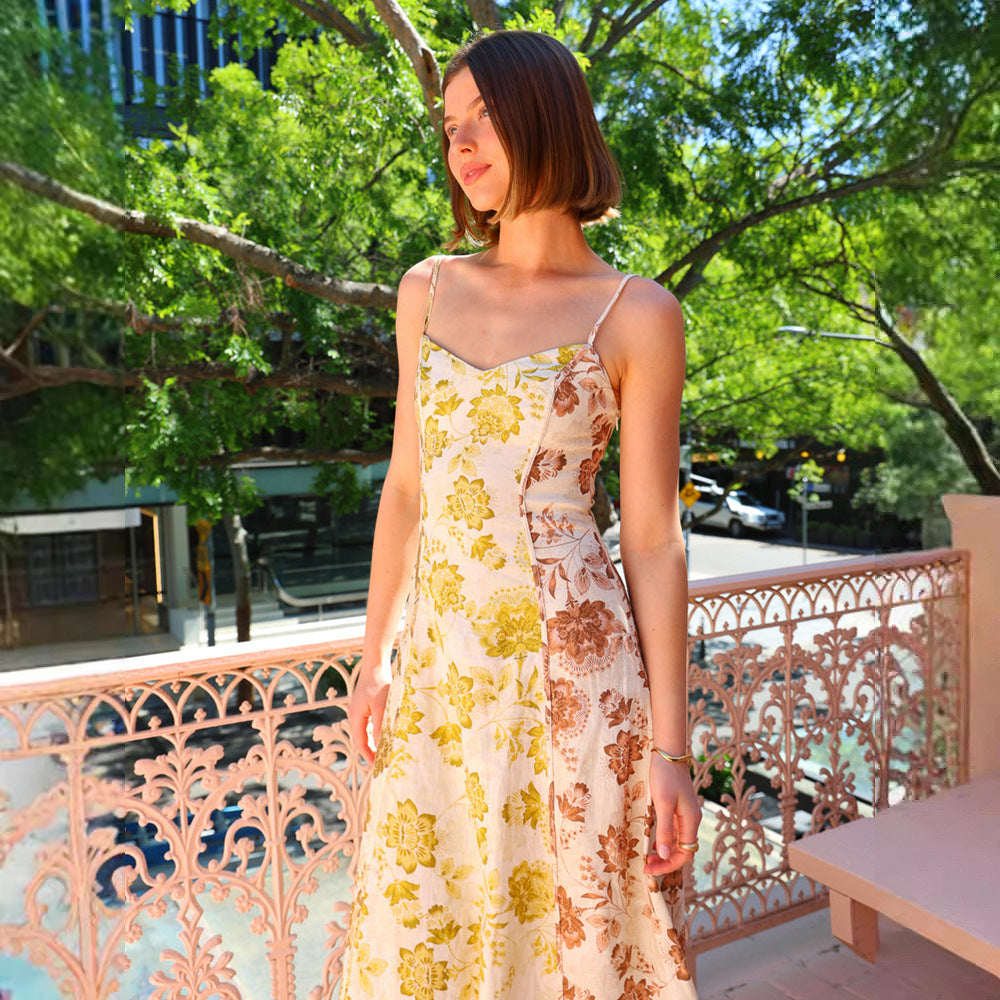 Women's Long Floral Dress with Adjustable Spaghetti Straps and Flowing Cut