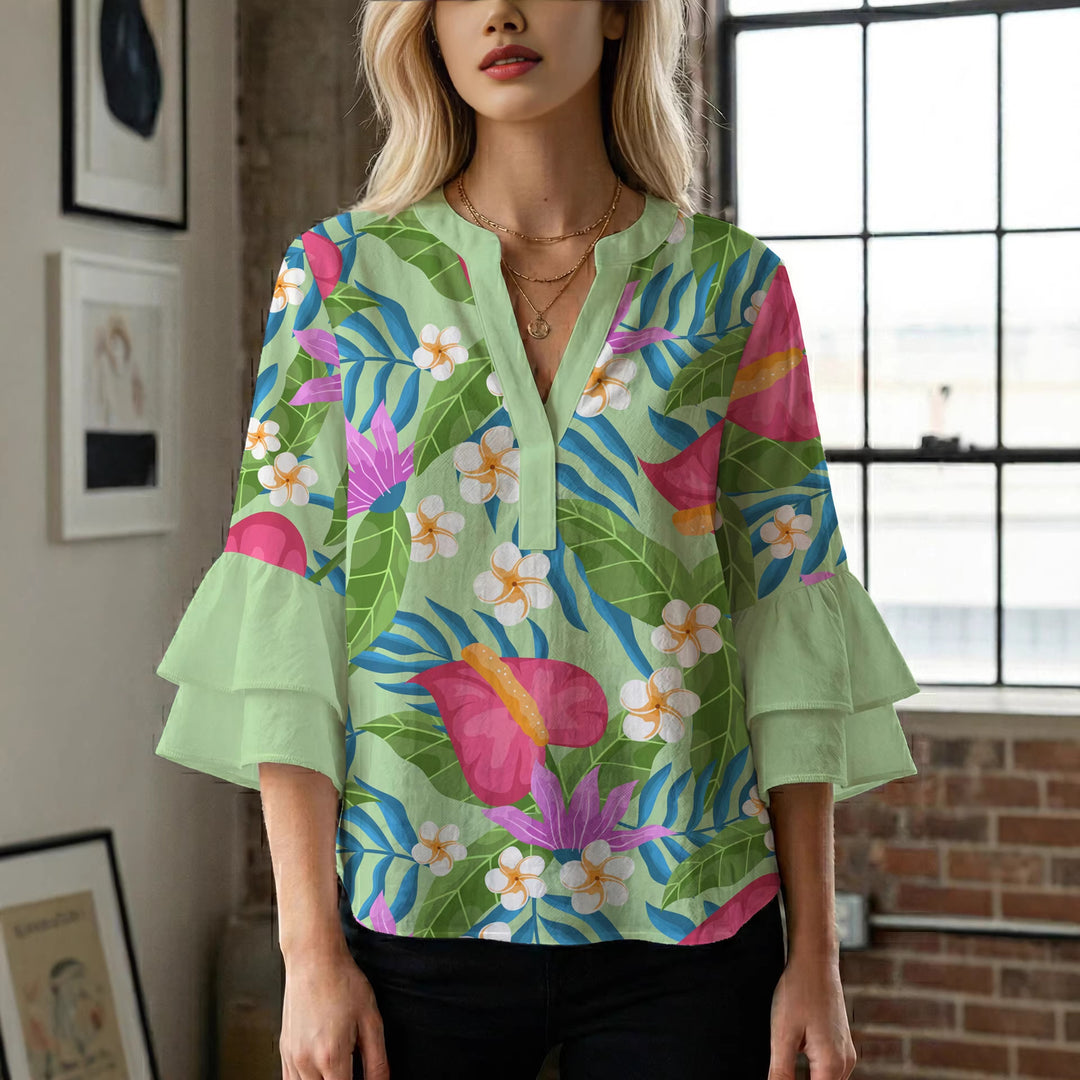 Women’s blouse with voluminous ruffled sleeves and floral pattern Lisslune