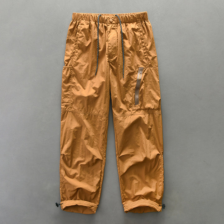 Men's functional trousers with elastic waistband and side zip pockets Lisslune