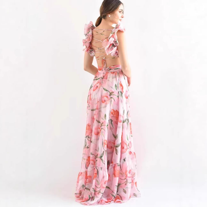 Women's maxi dress in romantic vintage style with a flowing skirt and ruffle details