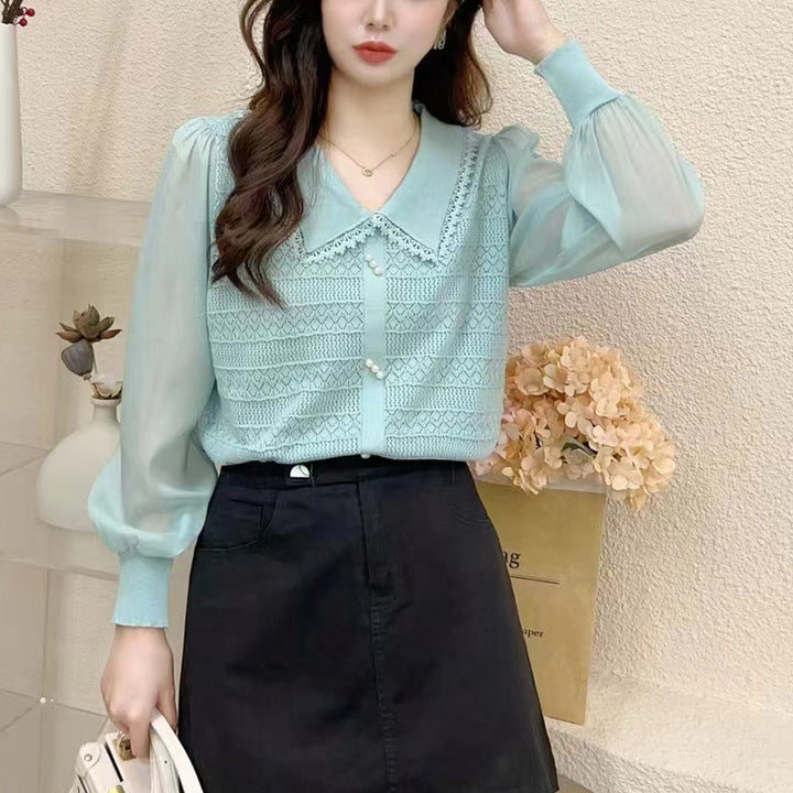 Women's blouse with lace collar and decorative buttons