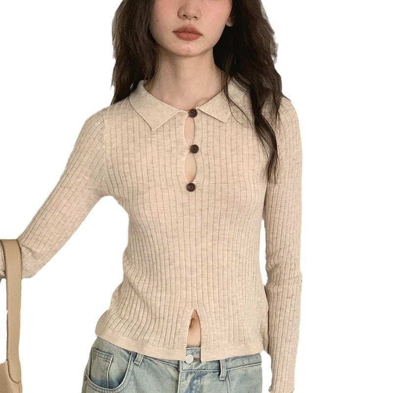Women’s fine ribbed top with decorative button placket and side slit