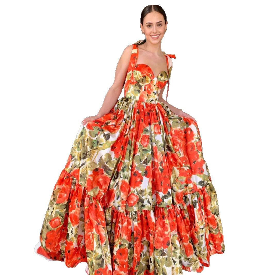 Ladies festive maxi dress with floral ruffle details and swinging skirt