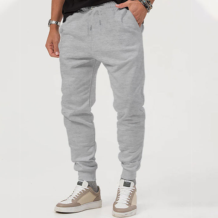Men's casual jogging pants with elastic waistband and side zip pockets Lisslune