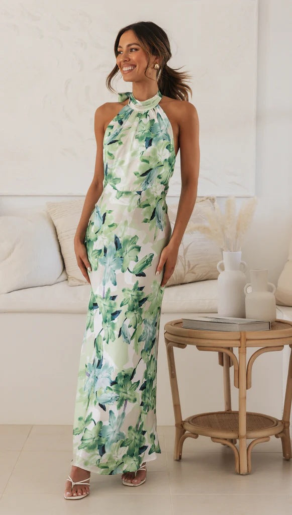 Women's maxi dress with high-neck halter design and floral pattern