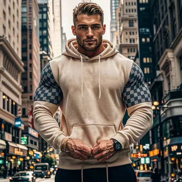 Men's hoodie with stylish checkered pattern on the sleeves and practical kangaroo pocket Lisslune