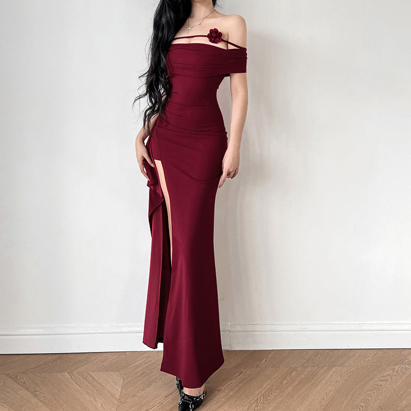 Women's elegant off-shoulder maxi dress with sophisticated cut and floral accents
