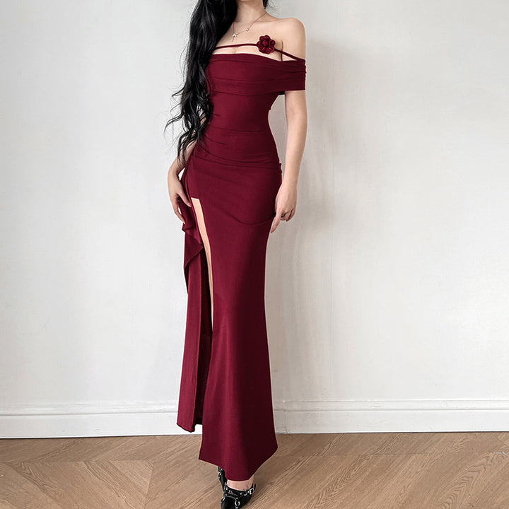 Women's elegant off-shoulder maxi dress with sophisticated cut and floral accents