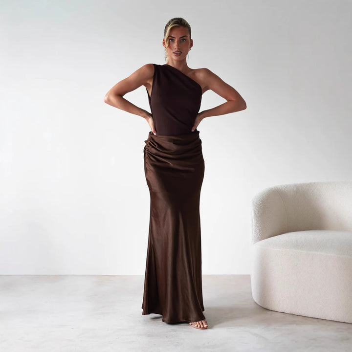 Women’s evening dress with asymmetrical cut and elegant draping design
