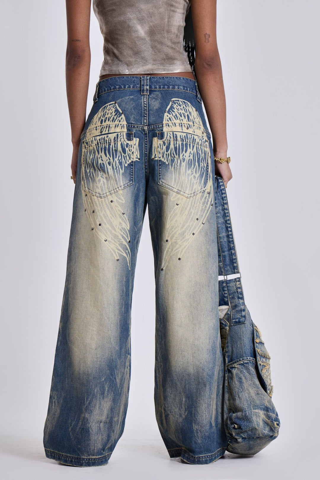 Damen weite Jeans mit kunstvollem Flügel-Design und einzigartigen Details Lisslune