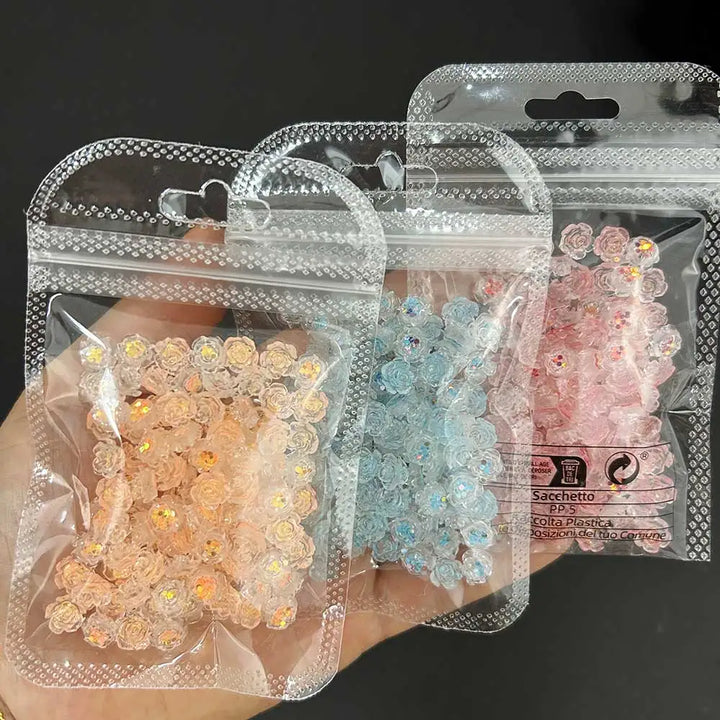 Rynx | 100 pcs. Light purple glitter camellia rose nail art charms 7.5/6mm flat back resin nail decoration sweet flowers nail supplies