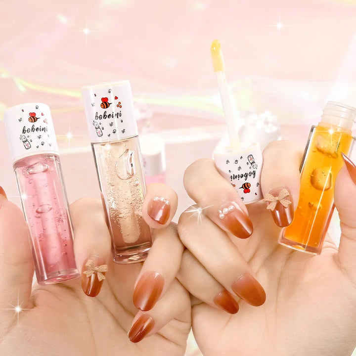 Rynx | Peach Honey Lip Oil alleviates dryness moisturizing lipstick fills lip lines water-light lip large brush head lip balm makeup cosmetics