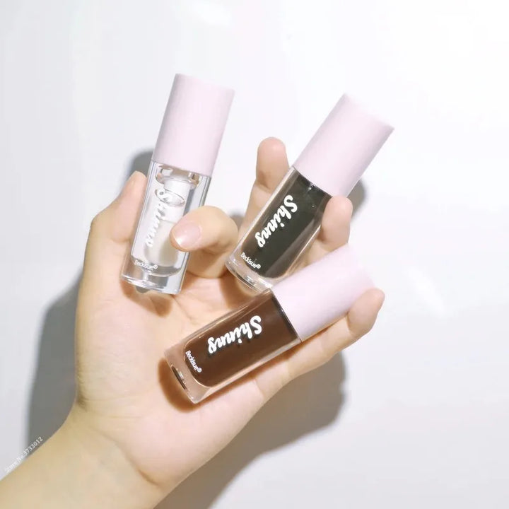 Rynx | Jelly Black Lip Oil Water Gloss Mirror Lip Glaze Moisturizing Translucent Lipstick Wrinkle Brightening Clear Lip Color Volumizing