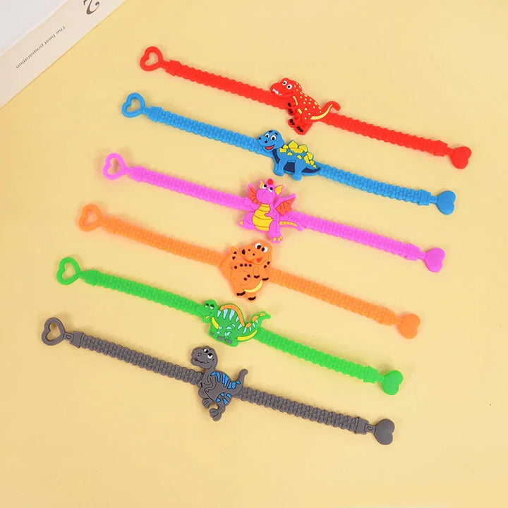Rynx 6 Piece Dinosaur Party Rubber Bracelets Rings Kids Boys Jungle Dino Theme Birthday Party Decorations Gifts for Guests