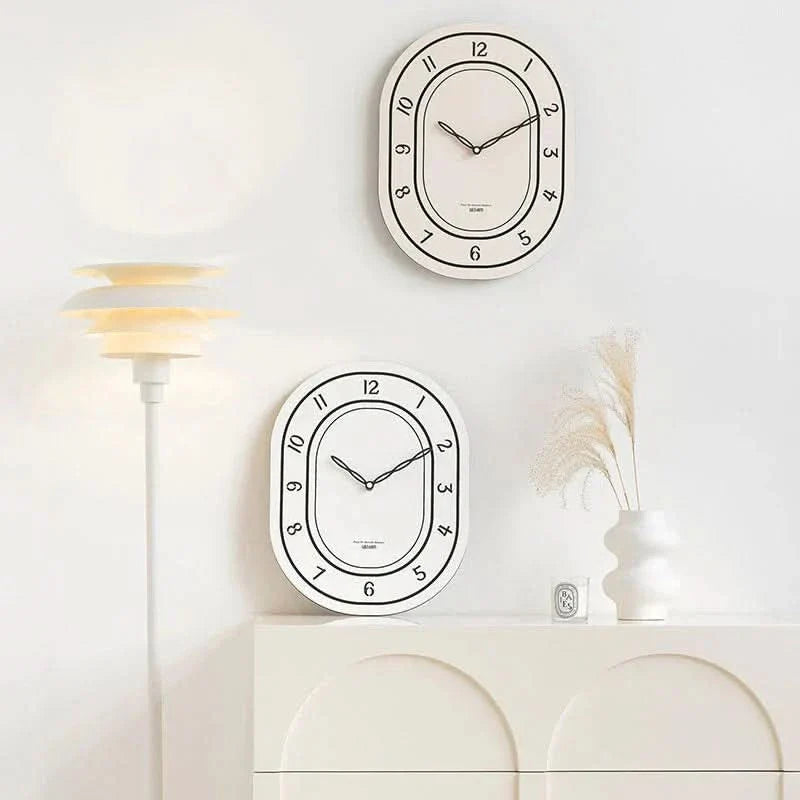 Lisslune | Silent Oval Wall Clock with Roman Numerals Design