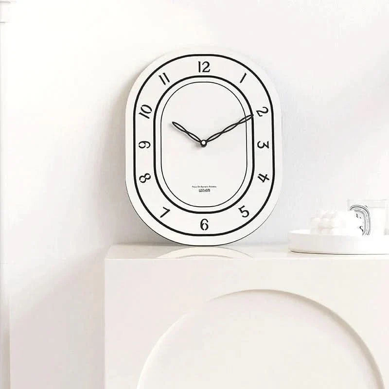 Lisslune | Silent Oval Wall Clock with Roman Numerals Design