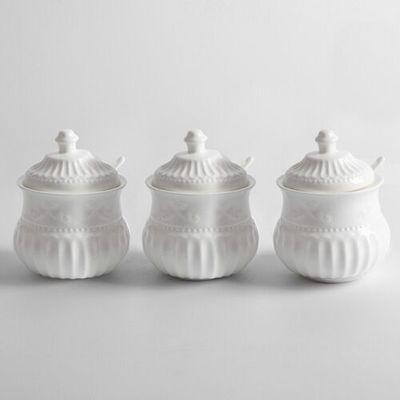 Lisslune | Elegant butterfly ceramic spice jar set with embossed designs, measuring spoons, and secure lids for stylish kitchen storage