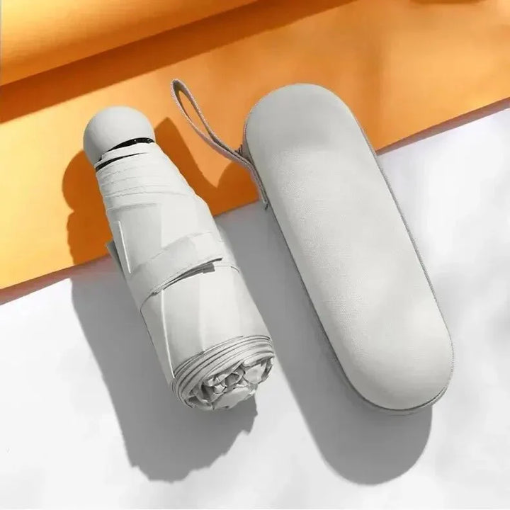 Lisslune | Capbrella Compact Umbrella – Ultra-Light Capsule Design for Stylish, Space-Saving Rain Protection