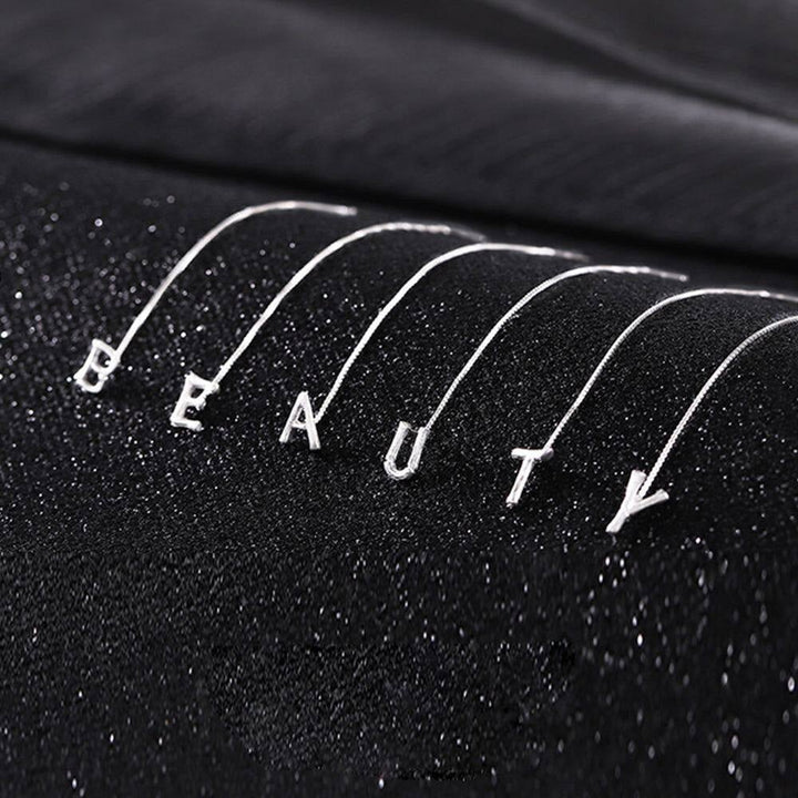 Lisslune | Shiny Alphabet Earrings