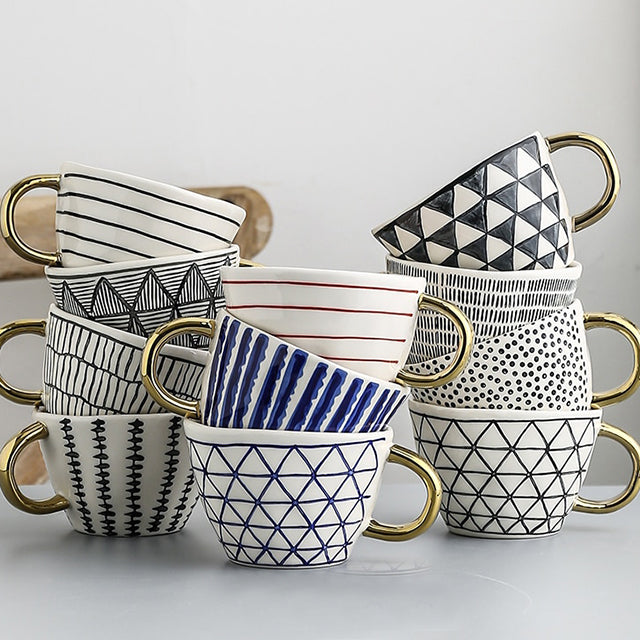 Lisslune | Cup with abstract geometric pattern and gold handle